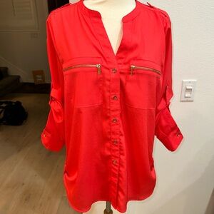 Calvin Klein — A Reddish/Tangerine colored Blouse with Gold Zipper Accents